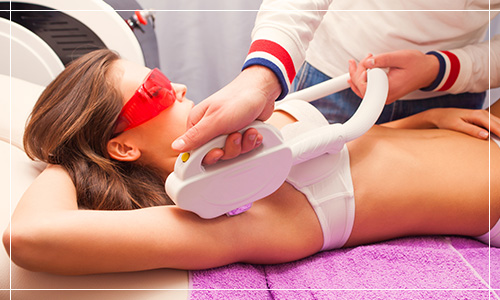 woman getting laser hair removal